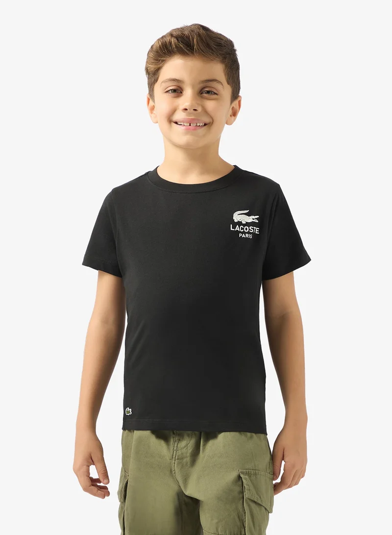 لاكوست تيشيرت بياقة دائرية بشعار للأطفال