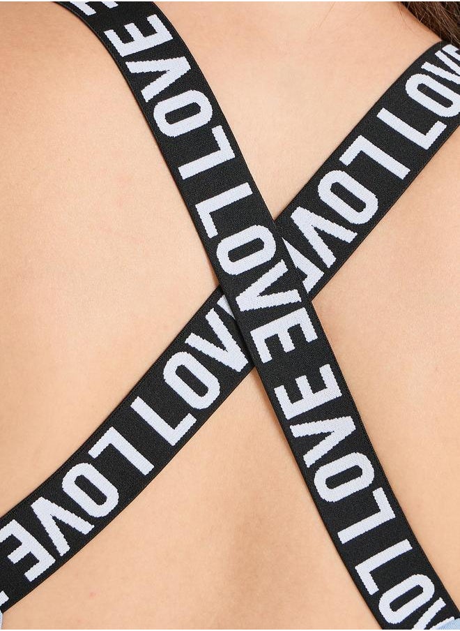 Styli - Styli Pack of 3 - Solid Top- Slogan Print Strap Sports Bra and Leggings - Image 1