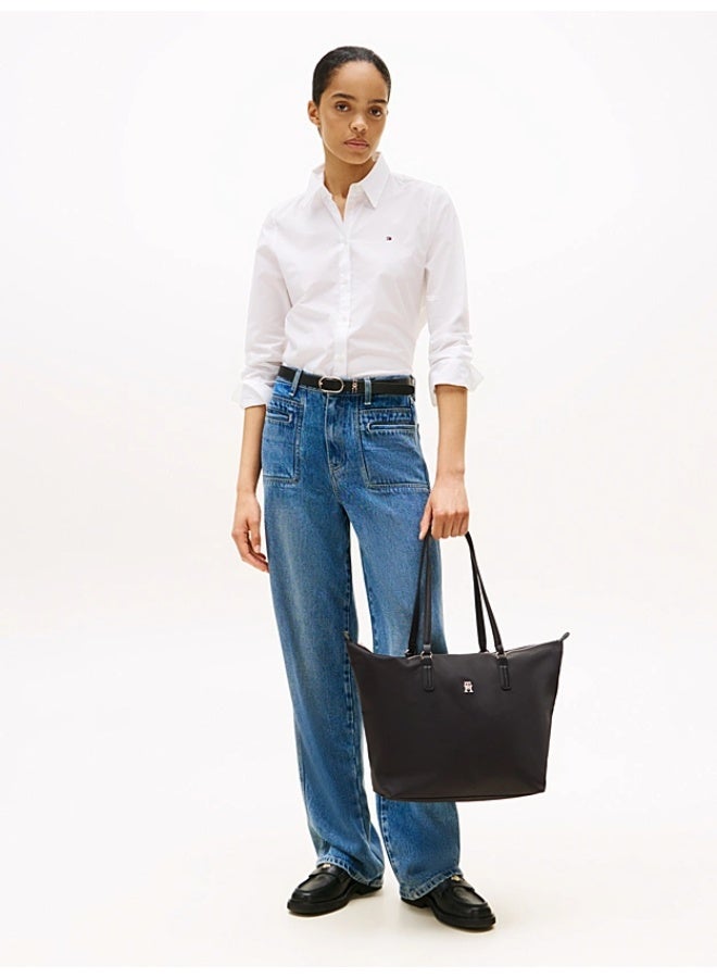 Tommy Hilfiger Denim حقيبة توت كلاسيكية سوداء اللون للنساء من تومي هيلفيغر سيجنتشر تاب، حقيبة كتف أنيقة متعددة الاستخدامات بسعة كبيرة للسفر والعمل وصالة الألعاب الرياضية - Image 2