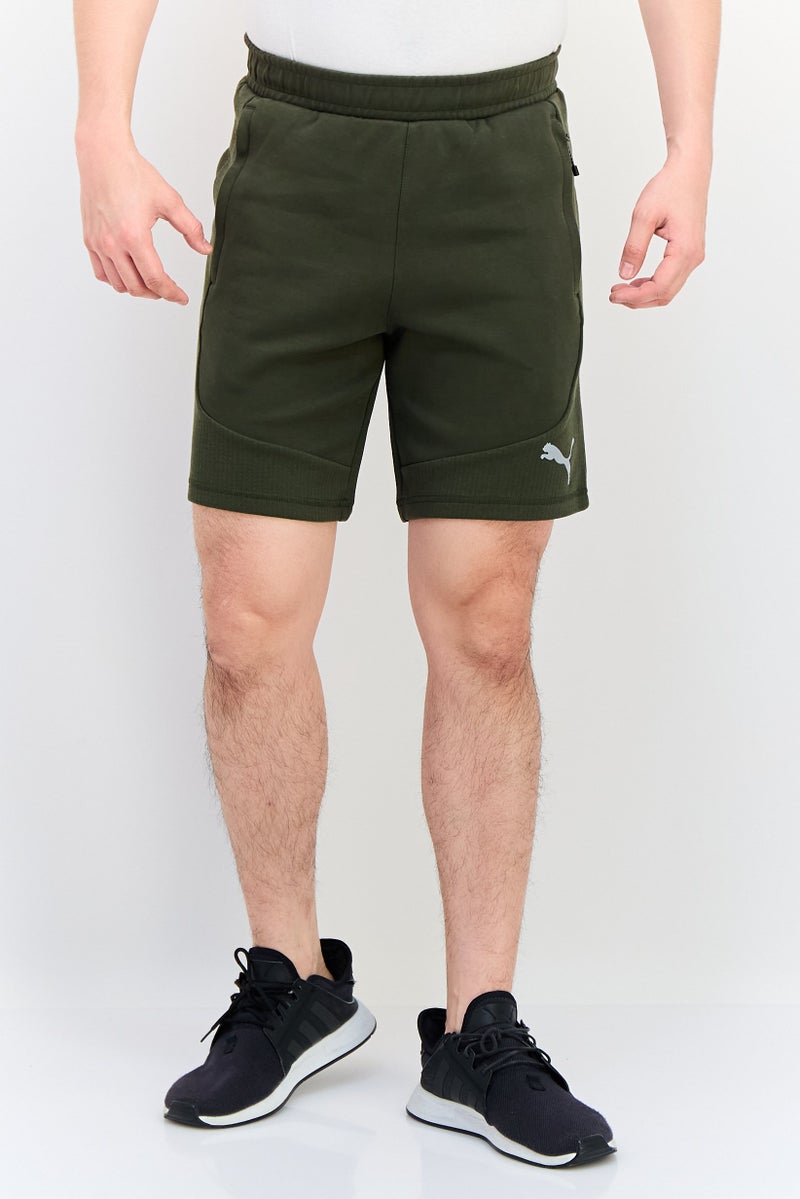 PUMA شورتات رياضية للرجال مناسبة في الهواء الطلق، أخضر غامق - Image 1