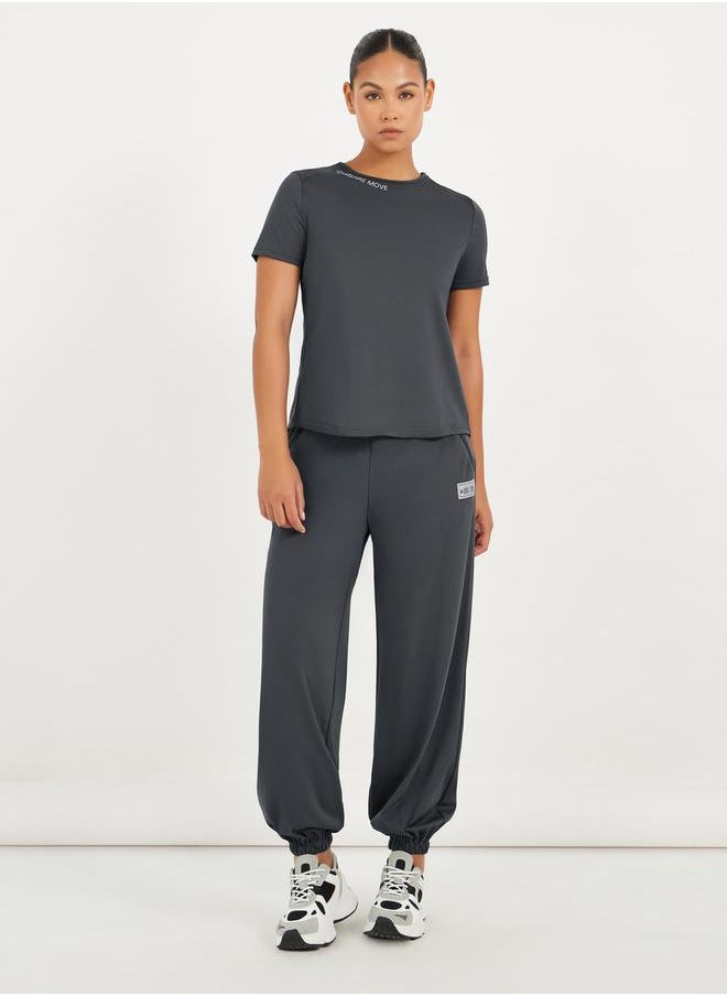 Styli - Gymspire Edition - Label Text Print Mesh Insert Short Sleeve Top - Image 1