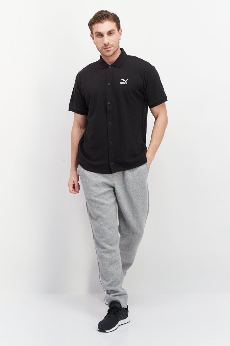 PUMA قمصان بولو تدريبية بشعار العلامة التجارية للرجال بتصميم مريح، أسود - Image 3