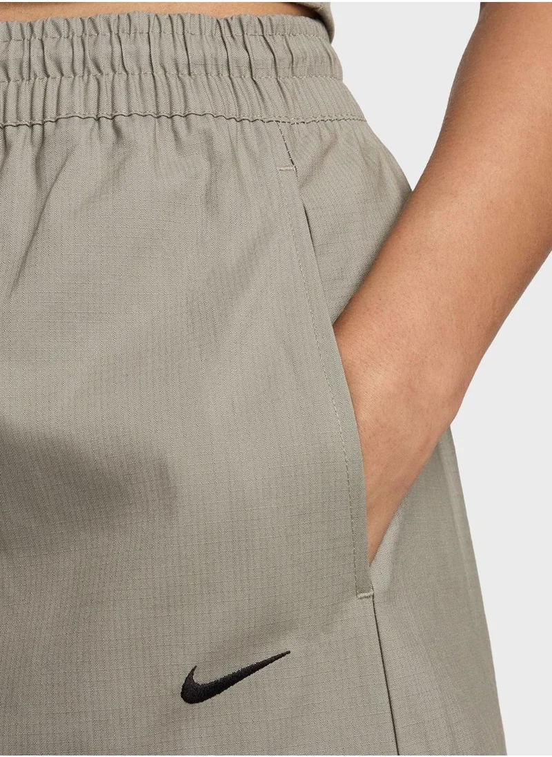 Nike Nsw Essential Woven Midrise Cargo Middi Skirt