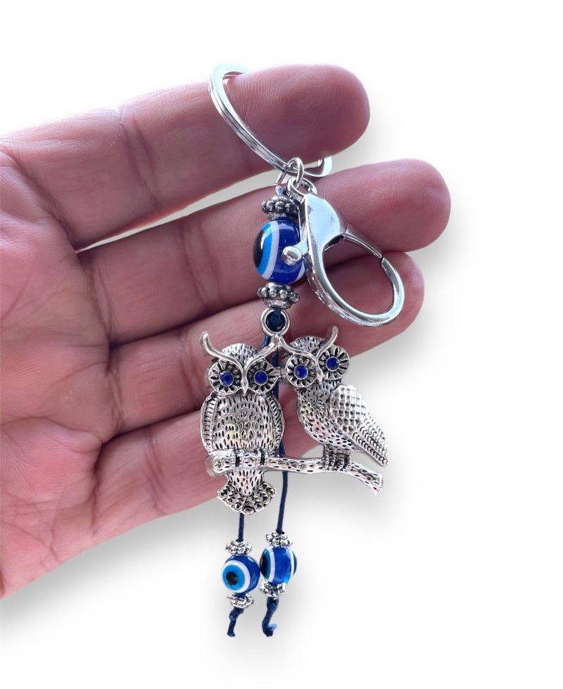 BLUE BEADS Silver Color Double Owl with Evil Eye Keychain For Bike/Car Gifting With Key Ring (Pack Of 1) - Image 1