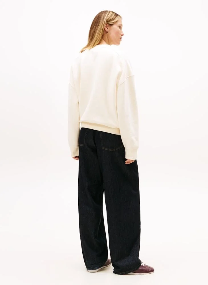 تومي هيلفيغر بلوزة قطنية برقبة على شكل حرف  برسومات