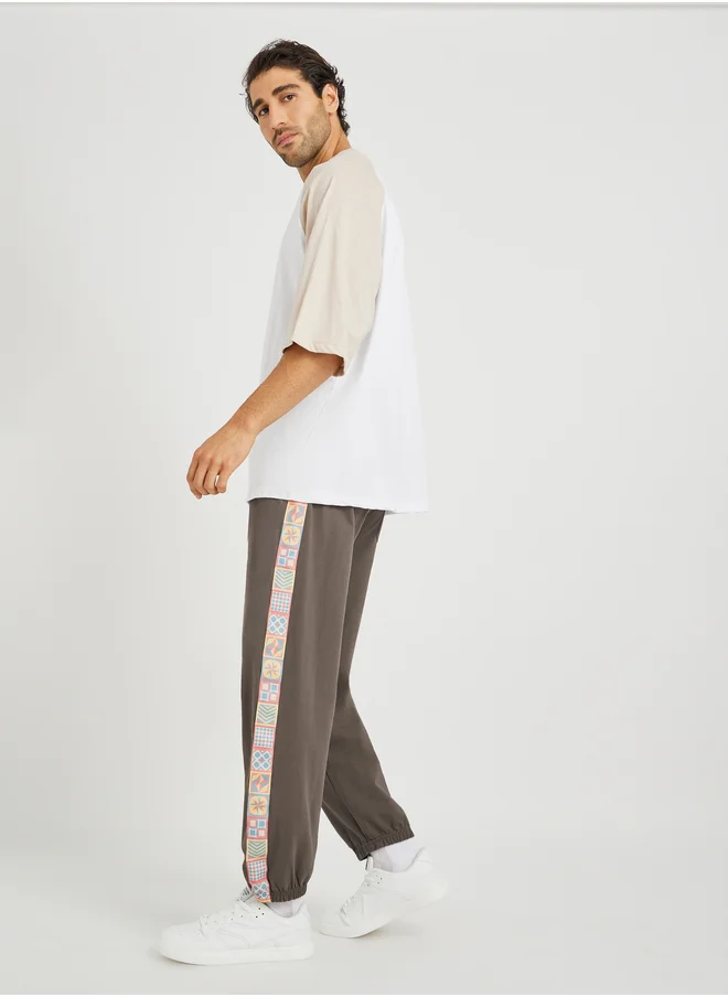 ستايلي Side Motif Printed Tape Relaxed Fit Joggers