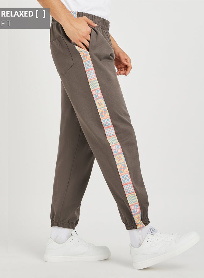 Styli Side Motif Printed Tape Relaxed Fit Joggers  - Image 1