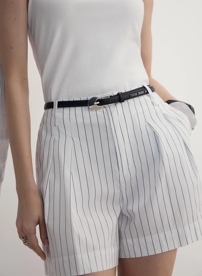 ليتشي حزام رفيع بإبزيم عريض