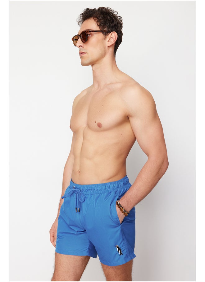 trendyol - Blue Men's Penguin Embroidered Swim Shorts TMNSS24DS00013 - Image 1
