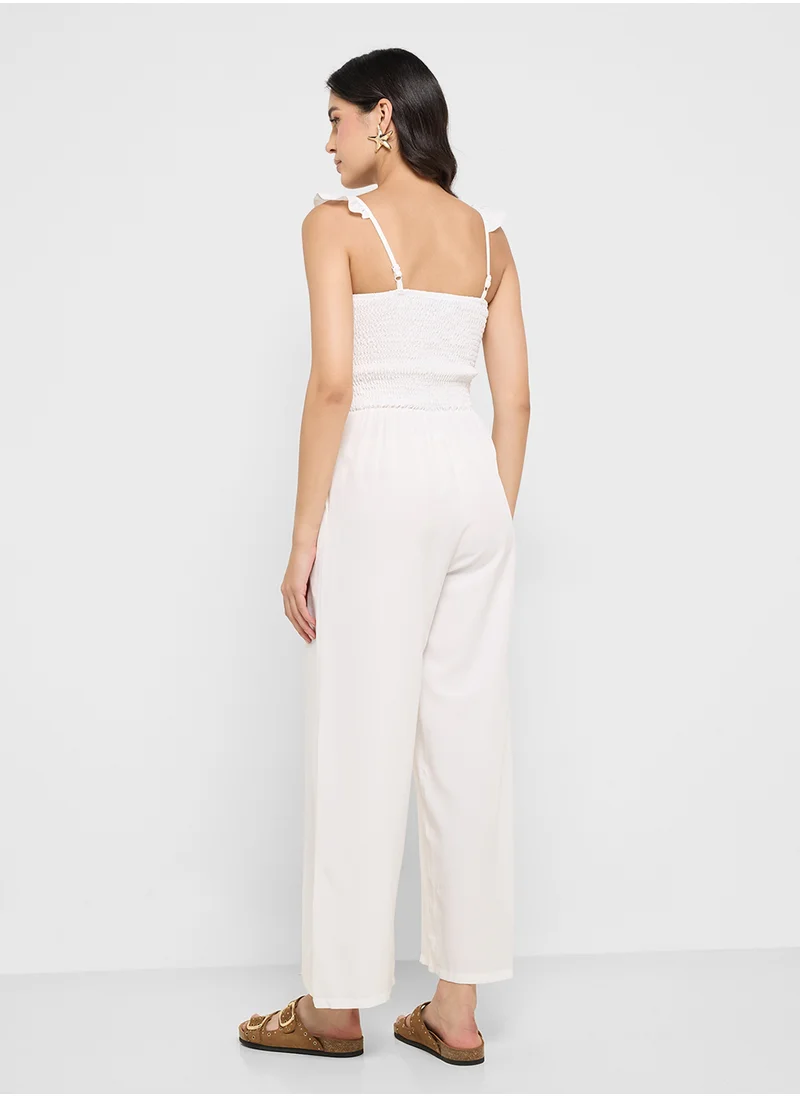 جينجر Ruffle Strap Smocked Wide Leg Jumpsuit