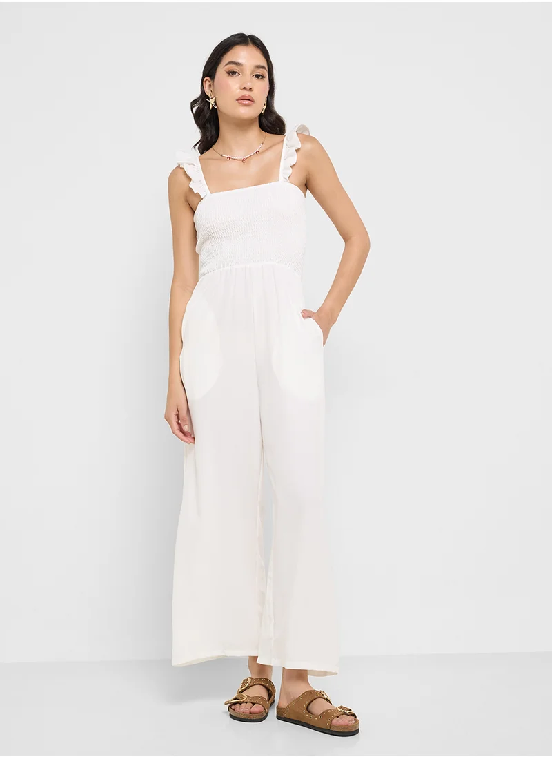 جينجر Ruffle Strap Smocked Wide Leg Jumpsuit