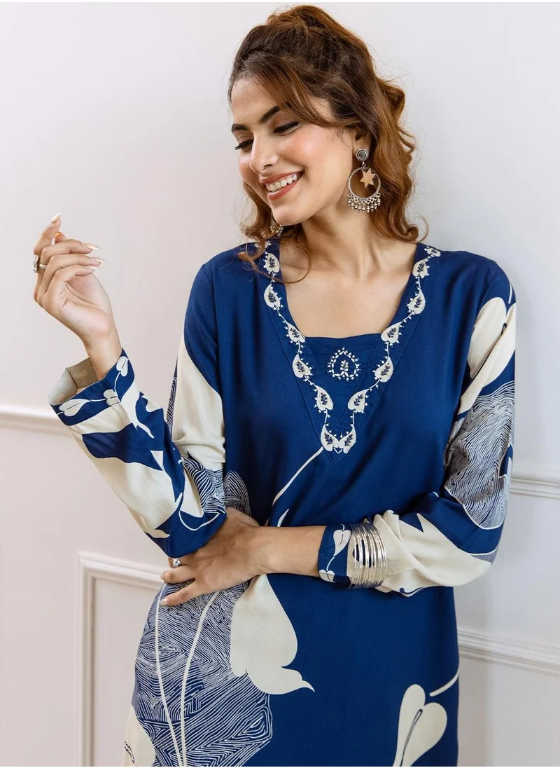 آي شين Regular Fit Embellished Pattern Round Neck Neck Three-Quarter Sleeve Blue Colour Knitted Rayon Kurta Set for Women with Mid-Rise Closure - A Timeless Addition to Your Collection