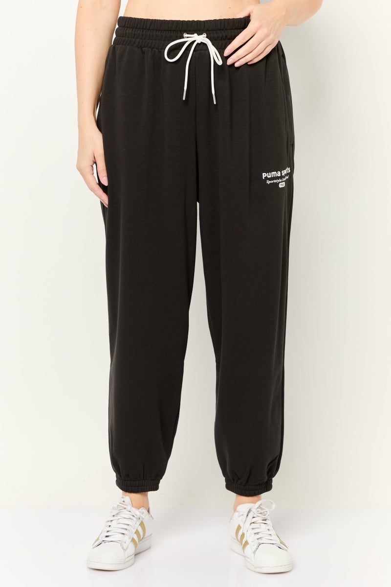 PUMA سروال رياضي خارجي مريح للنساء، أسود - Image 1