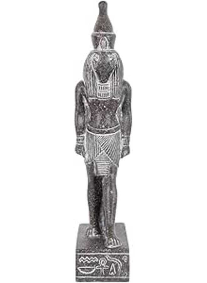 Ancient statue for hours made of black granite stone