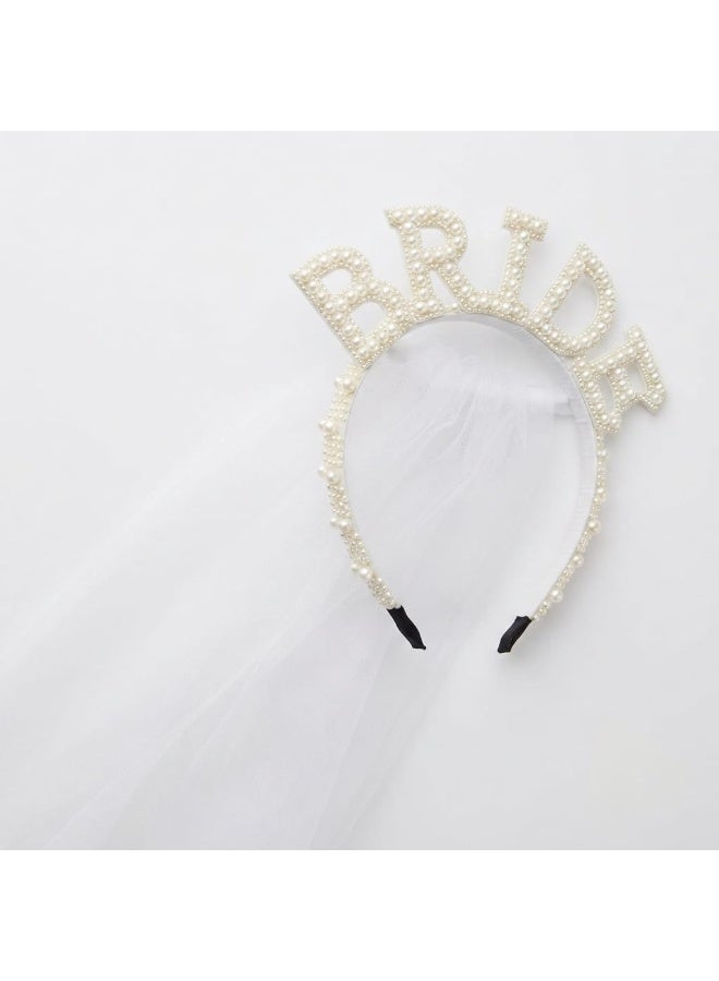 A pearl-adorned bridal headband paired with a classic white veil an elegant hair accessory for weddings and special occasions - Image 4
