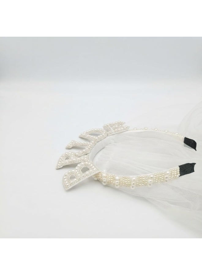 A pearl-adorned bridal headband paired with a classic white veil an elegant hair accessory for weddings and special occasions - Image 5