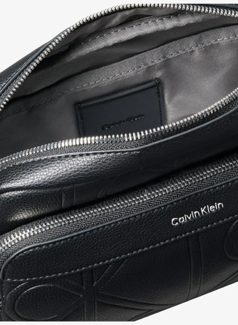 CALVIN KLEIN  Emblem AOP Embossed Camera Bag for Men | Best Price UAE