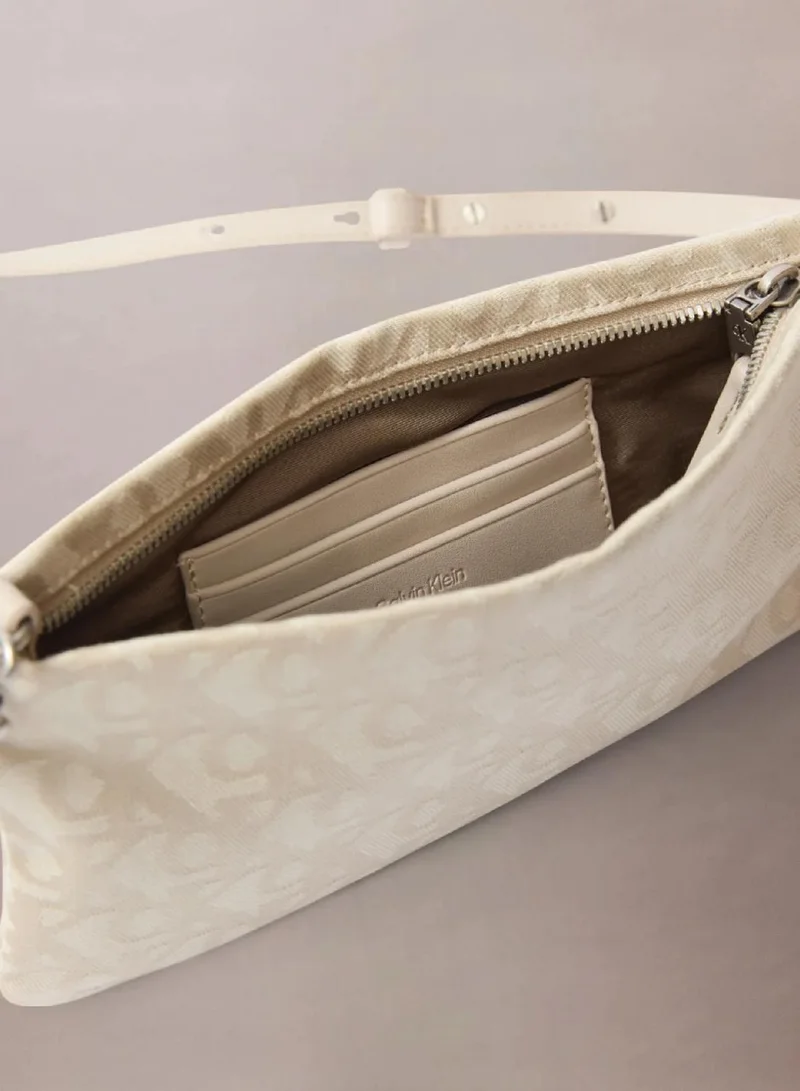 Calvin Klein Jeans NATURAL AOP Monogram Mini Crossbody Bag for Women | Best Price UAE