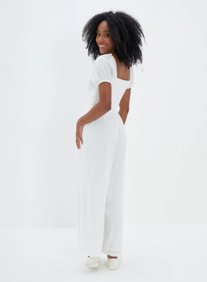 امريكان ايجل AE Smocked Puff-Sleeve Jumpsuit