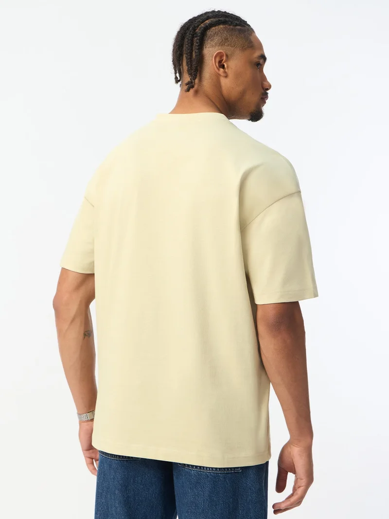 The Souled Store  The Souled Store New Basics: Latte Men and Boys Short Sleeve Spread Collar Latte Cream Solid Textured Cotton Oversized Fit Lightweight Everyday All-Season Polo Shirts  | Best Price UAE
