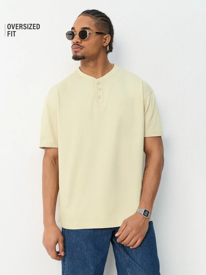 The Souled Store  The Souled Store New Basics: Latte Men and Boys Short Sleeve Spread Collar Latte Cream Solid Textured Cotton Oversized Fit Lightweight Everyday All-Season Polo Shirts  | Best Price UAE