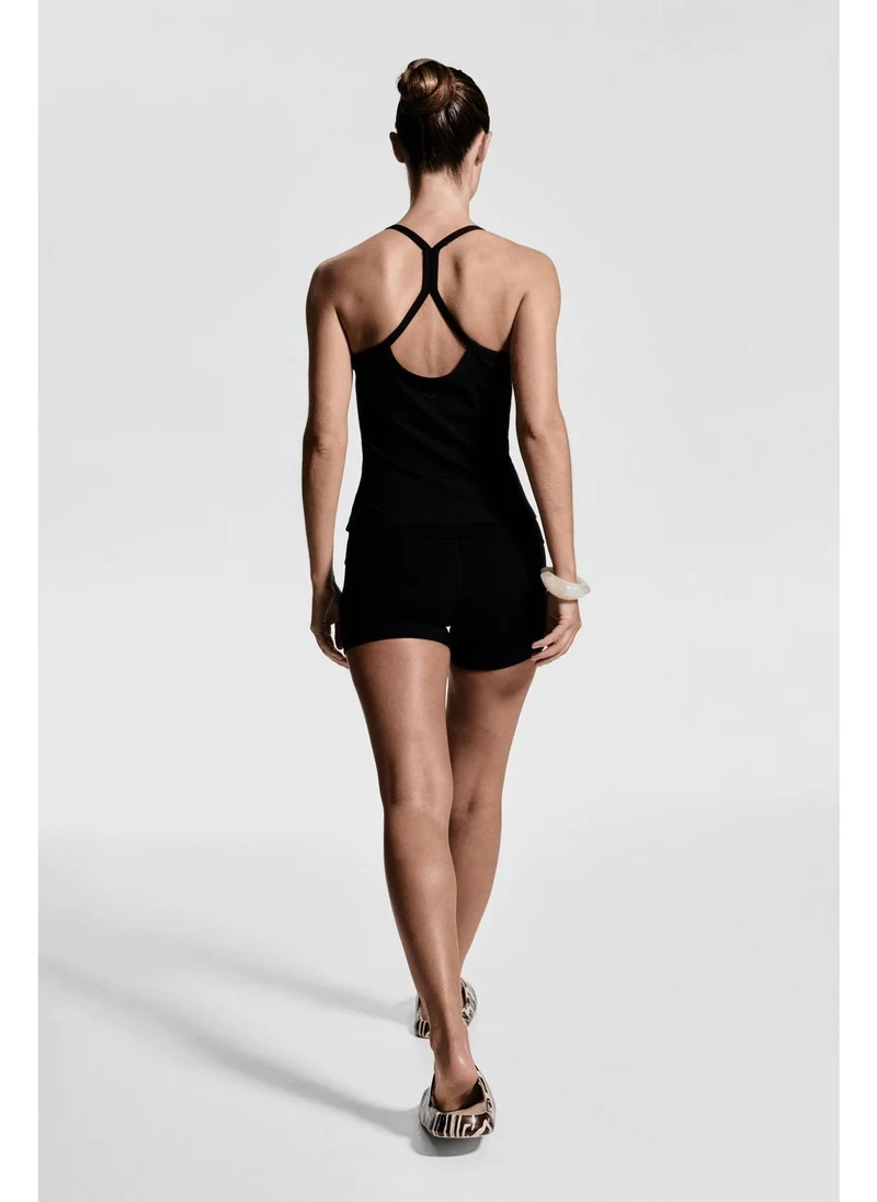 H&M Integral-bra sports strappy top with SoftMove™