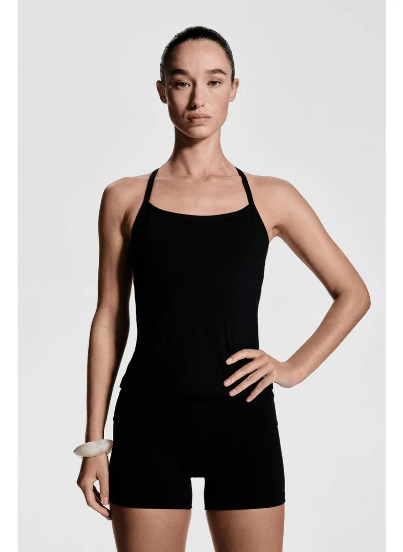 H&M Integral-bra sports strappy top with SoftMove™