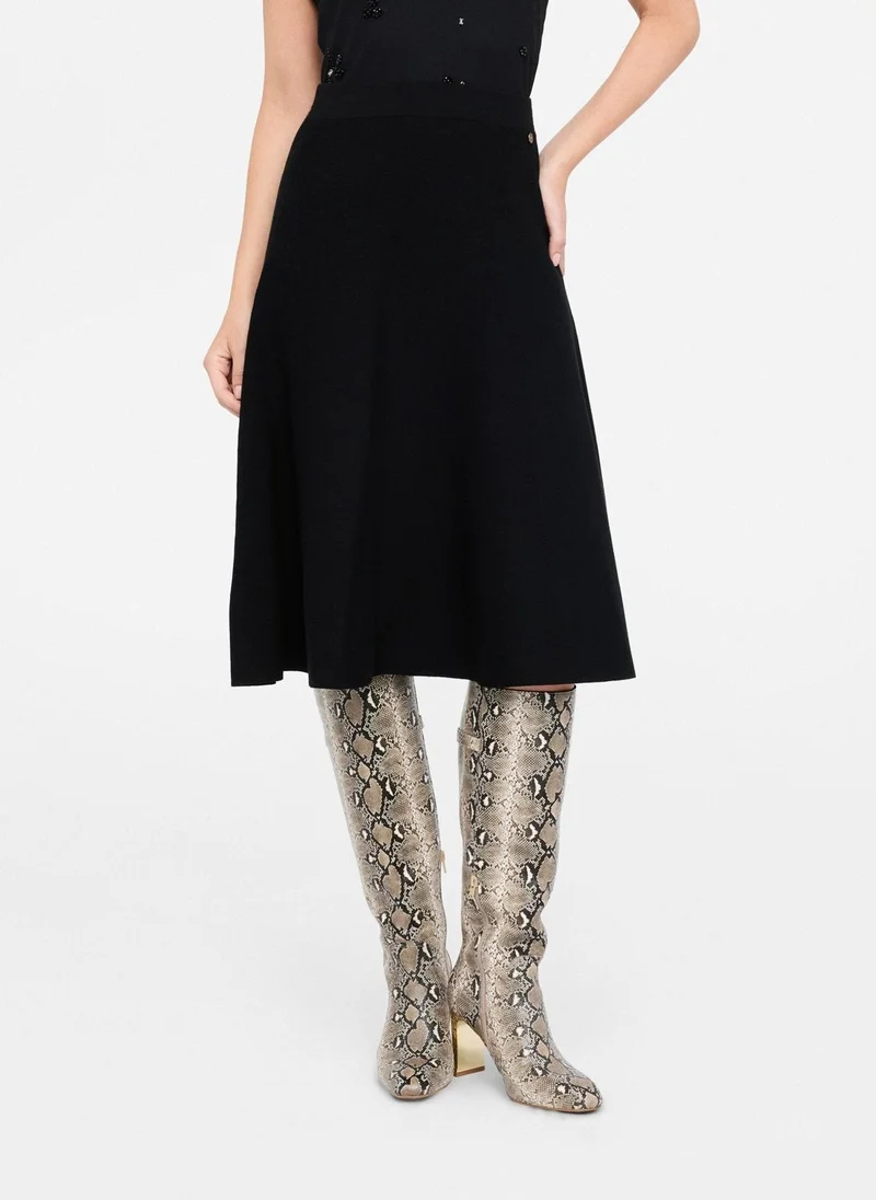 ليو جو تنورة ميدي محبوكة