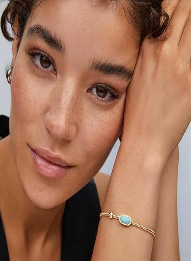 كيندرا سكوت سوار كيندرا سكوت غرايسون المطاطي، مصنوع من النحاس المطلي بالذهب عيار 14 قيراطًا، مرصع بعرق اللؤلؤ، مجوهرات أنيقة للنساء - Image 3