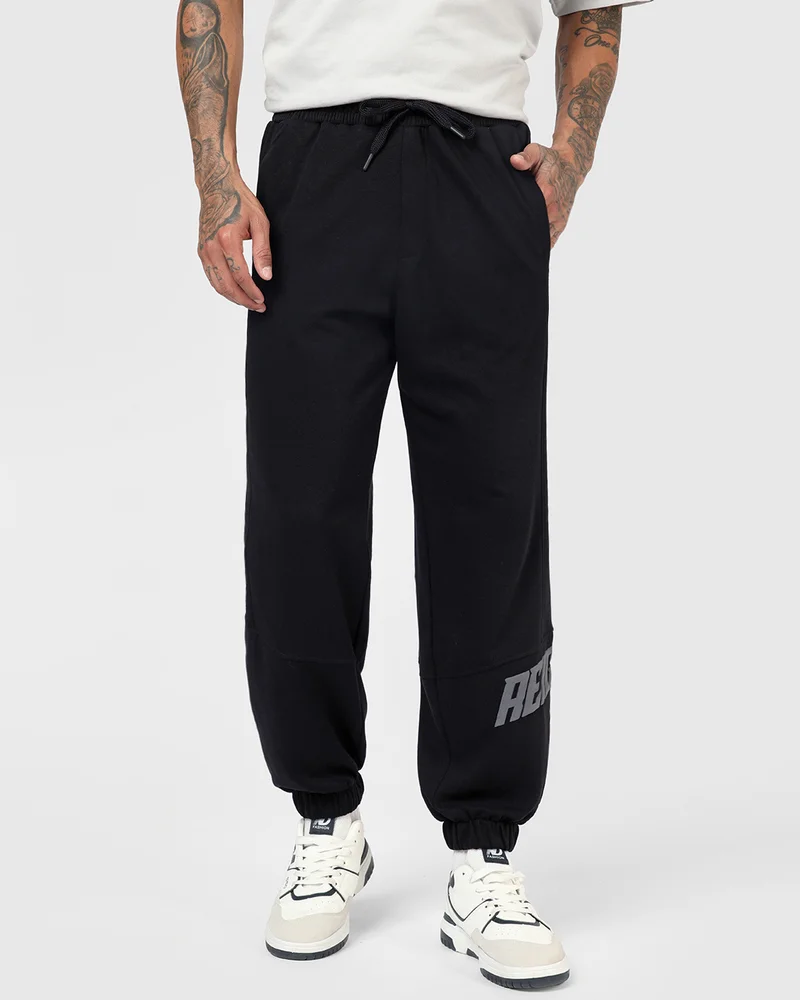 بيواكوف Men's Jet Black Reignite Typography Oversized Joggers