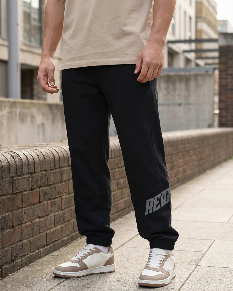 بيواكوف Men's Jet Black Reignite Typography Oversized Joggers