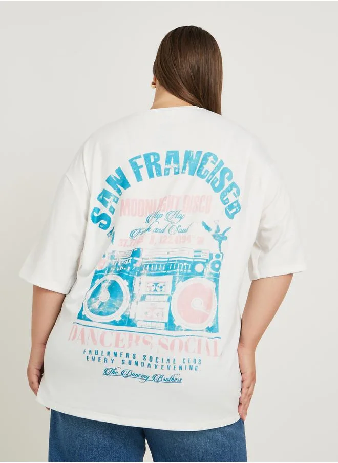 ستايلي Styli Plus Size Graphic Print Dropped Shoulder Oversized T-Shirt
