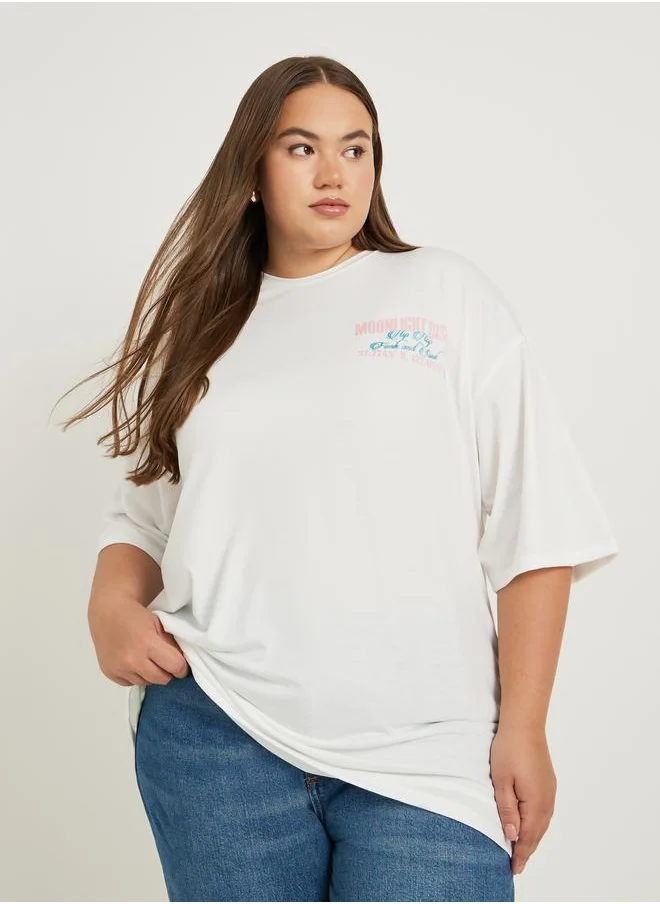 ستايلي Styli Plus Size Graphic Print Dropped Shoulder Oversized T-Shirt