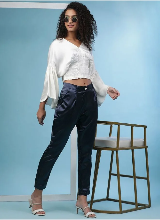 مرفوعة Women Tapered Solid Mid-Rise Pants