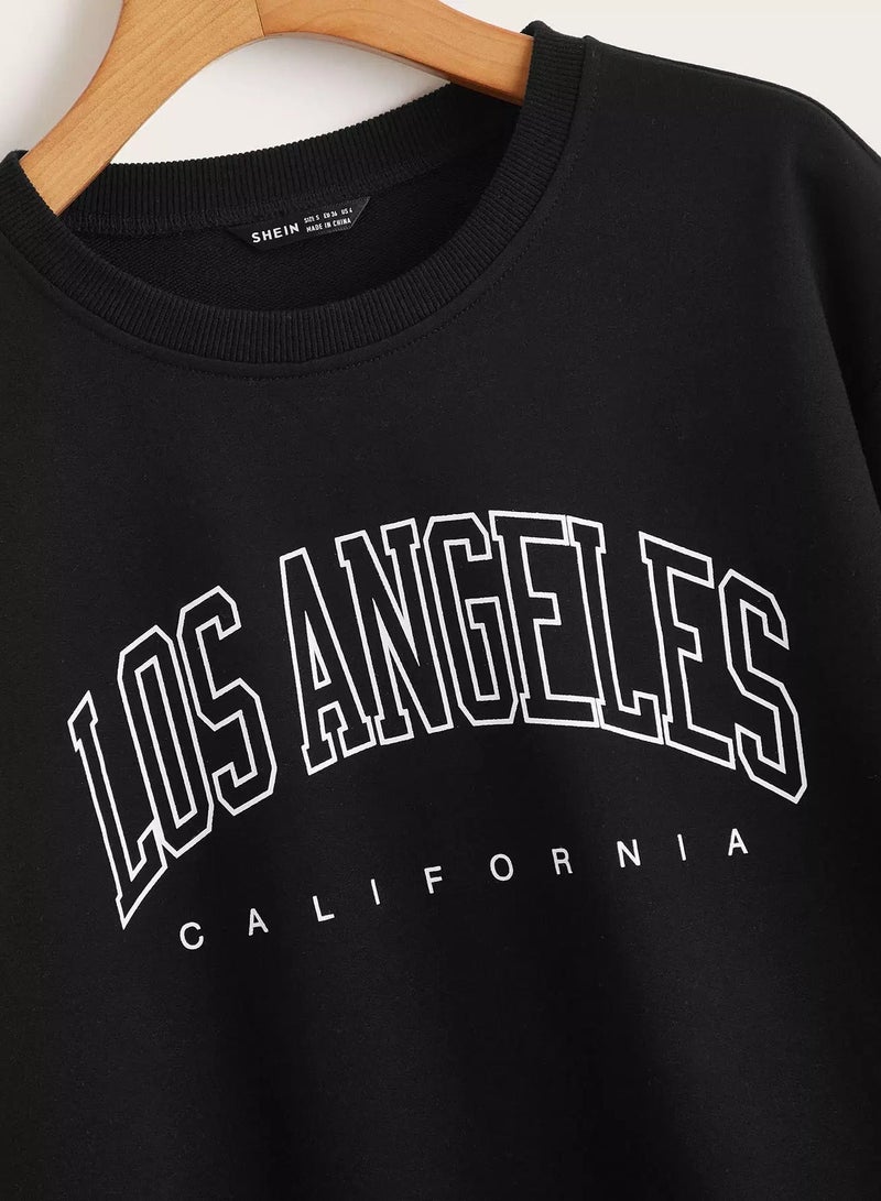 بلوفر مزين بحروف جرافيكية - Image 3