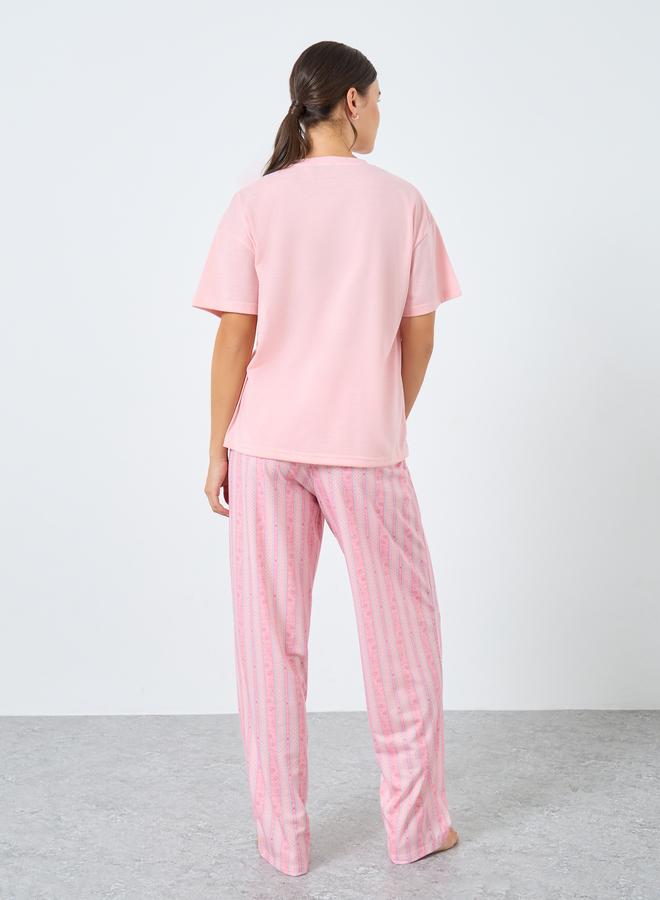 ستايلي طقم من بنطال بيجاما وتيشيرت سادة بأكتاف منخفضة - Image 4