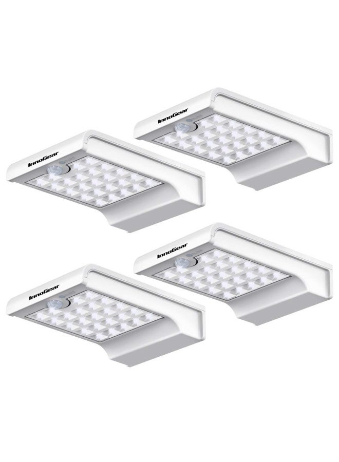 InnoGear Solar Lights Outdoor 24 LEDs Solar Motion Lights Outdoor Waterproof Solar Powered Wall Sconces Motion Sensor Outdoor Lights Solar Flood Light for Yard Porch Patio Pack of 4 - Image 1