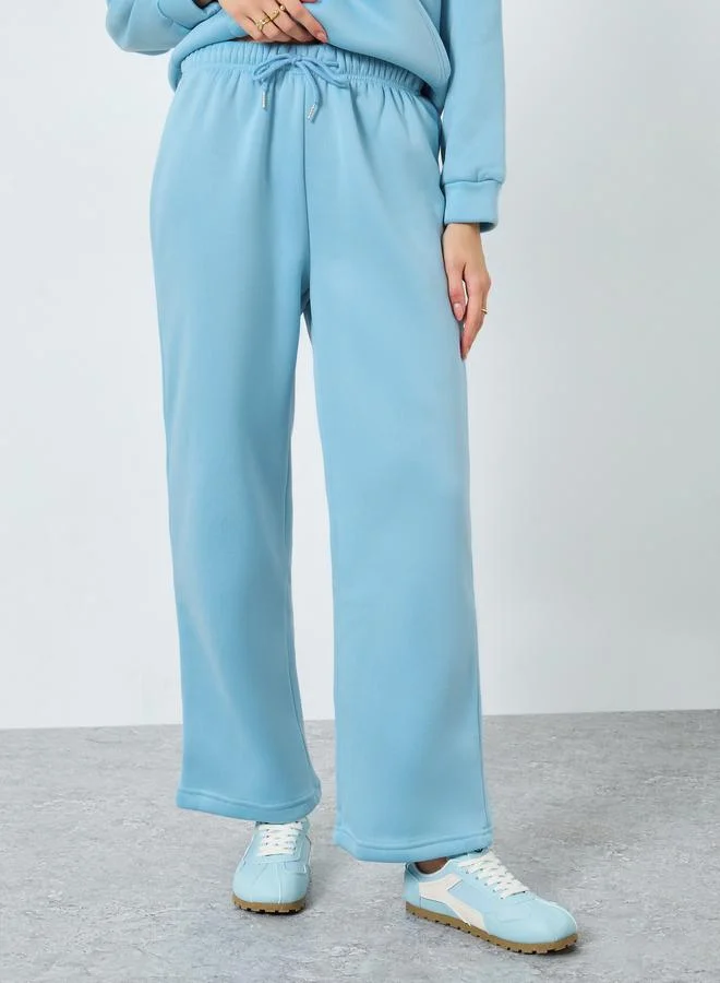 Styli Blue Solid Zip Collar Sweatshirt and Joggers Set