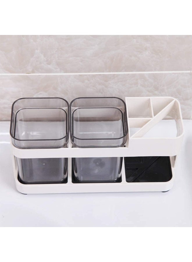 Plastic Bathroom Toothpaste And Toothbrush Holder With Two Rinse Cups, Multi-Functional Four-Slot Electric Toothbrush Holder For Bathroom Countertops. - Image 1