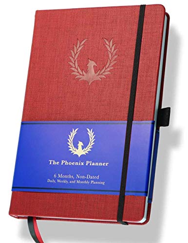 Phoenix Planner The Phoenix Planner - Best Daily Calendar and Agenda for Goal Setting, Boost Happiness and Productivity - Gratitude Journal, Habit Tracker, Quarterly Business Planner - 6 Months, Undated (Crimson) - Image 1