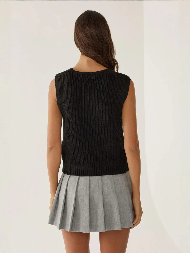 زوبعة كنزة صوف بأزرار