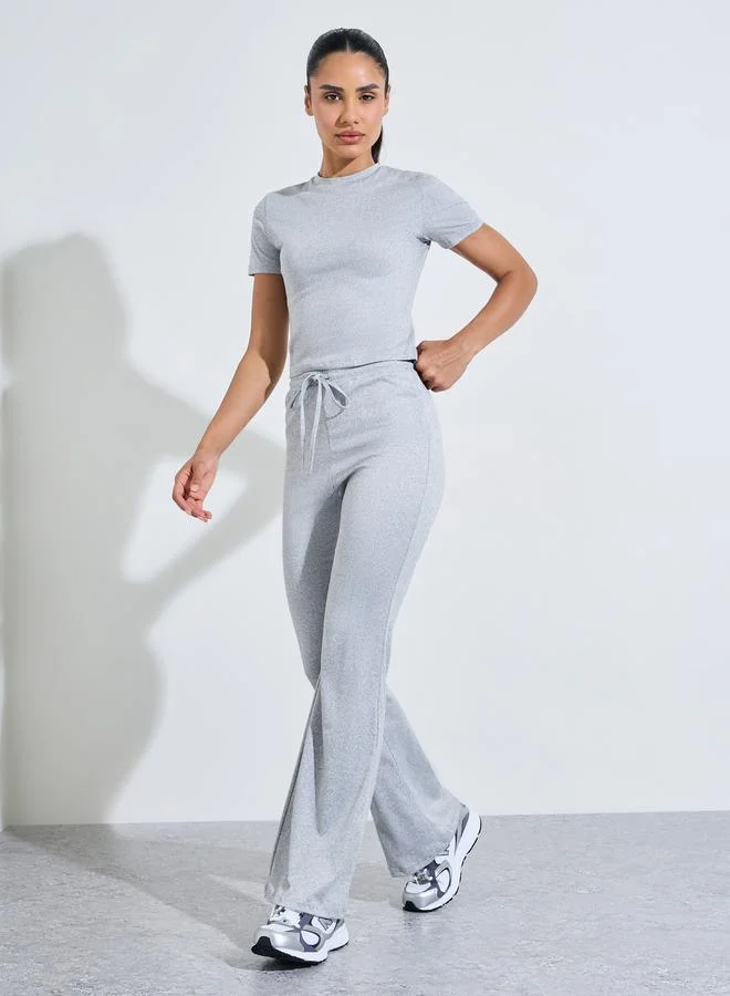 Grey Solid Fitted T-Shirt And Flared Pants Active Set