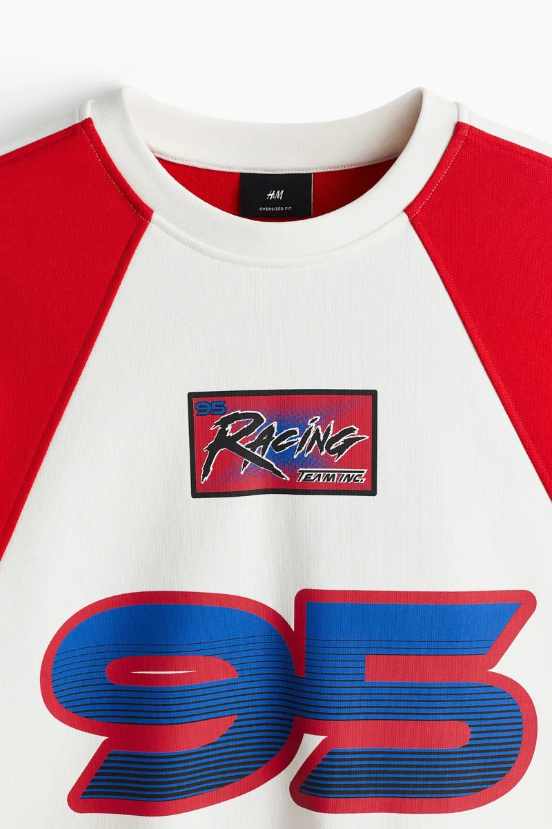 اتش اند ام سويت-شيرت فضفاض بطبعة مميزة