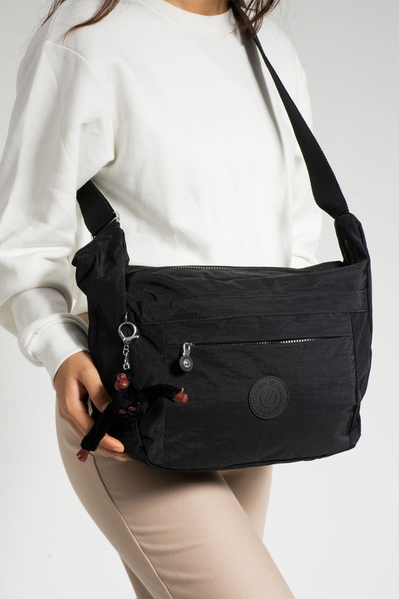Sanmorris Women's Waterproof Fabric Multi-Eye Crossbody School Travel and Shoulder Bag  - Image 1