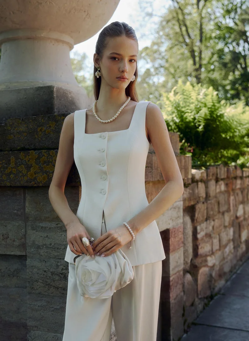 Lichi Flared waistcoat with tonal buttons