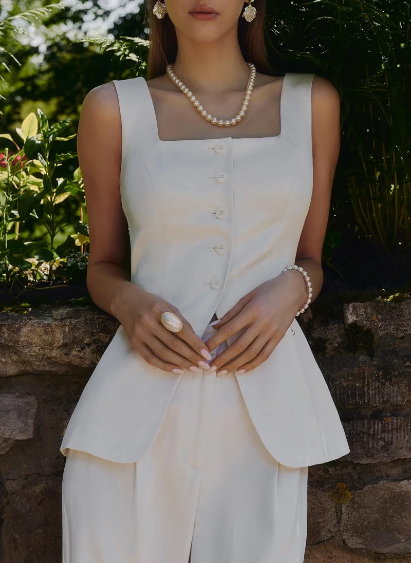 Flared waistcoat with tonal buttons