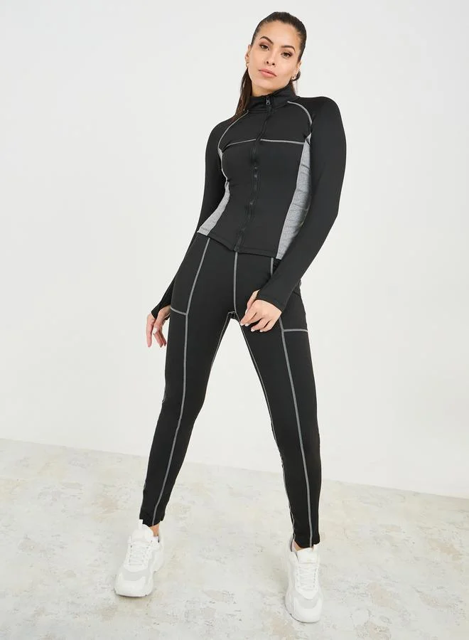 ستايلي اكتيف طقم جاكيت بسحاب بتفاصيل خياطة متباينة وألوان متضاربة مع بنطلون ليجنز