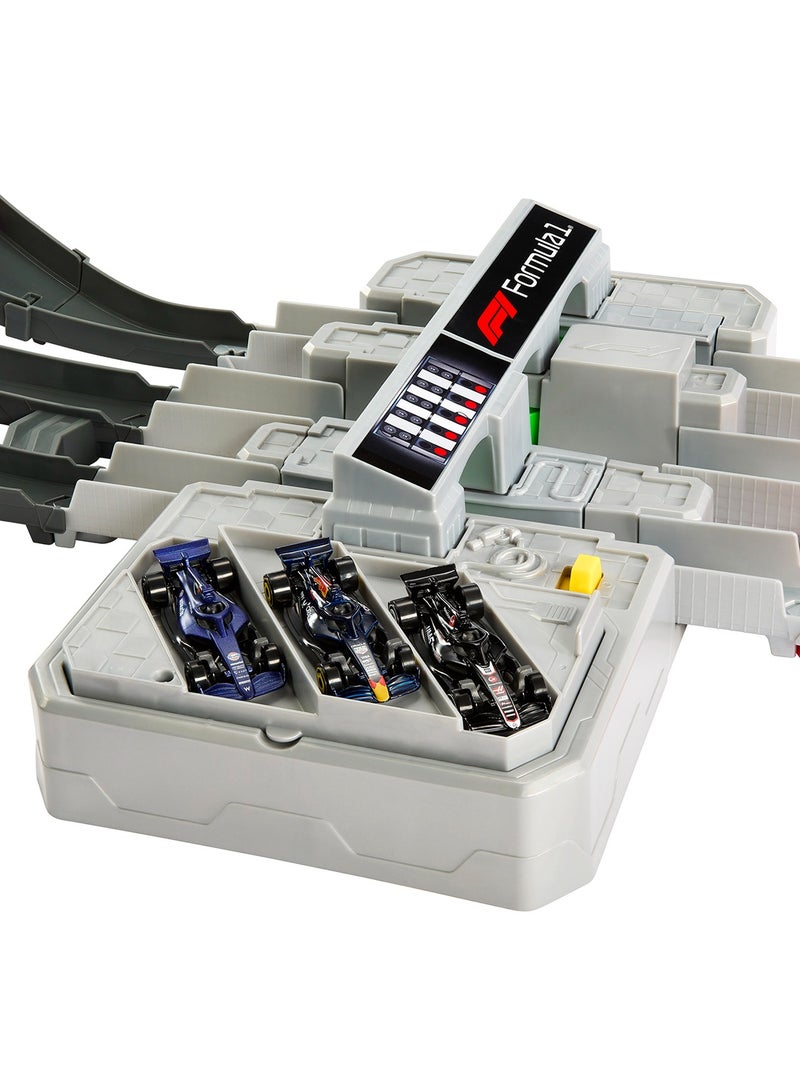 Hot Wheels Toy Car Track Set, Formula 1® Grand Prix Circuit Track Set with 3 1:64 Scale Die-Cast Toy Cars, Two Modes of Racing with a Motorized Booster - Image 3