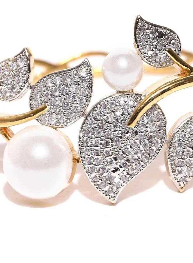 Priyaasi Interlock Women Metal Bracelet with pattern and secured with Interlock closure and styled in ideal for Western moments — a must-have for your statement wardrobe.