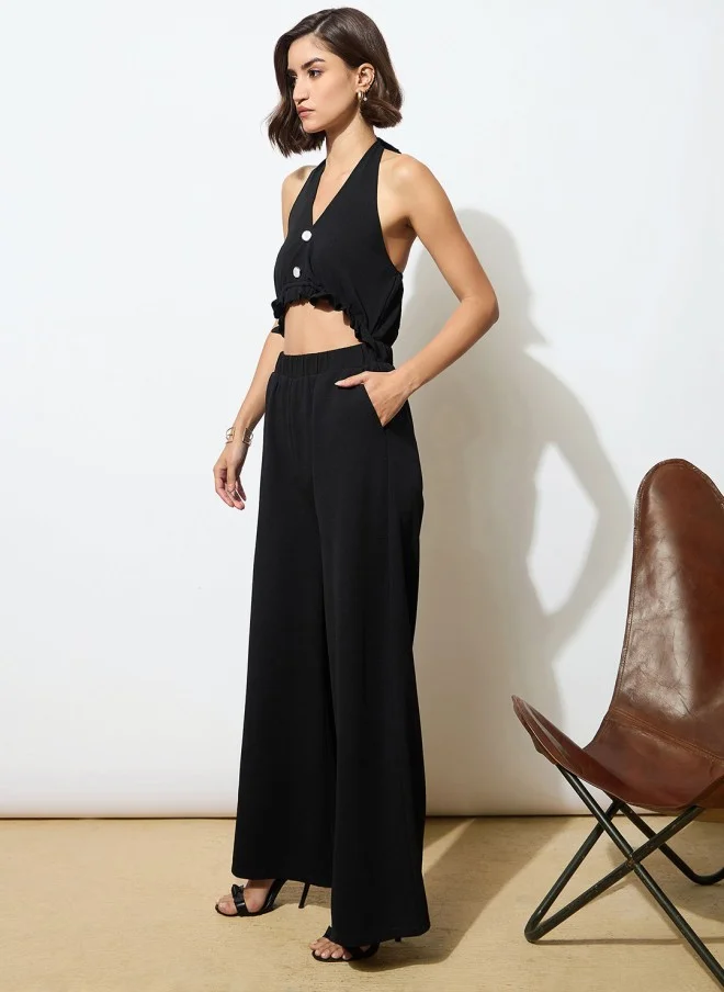 SASSAFRAS Black Halter Neck Jumpsuit for Women